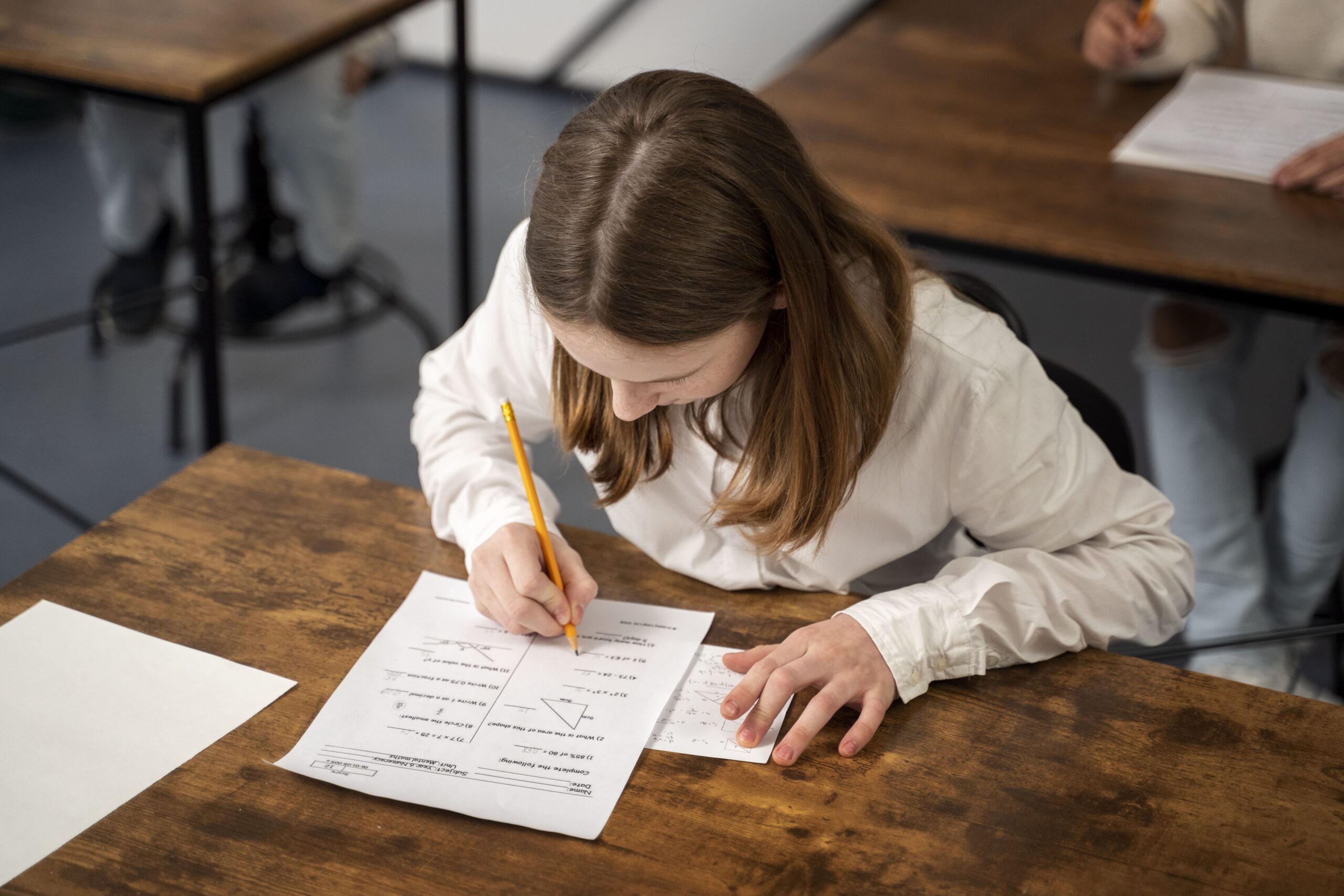 medium-shot-kid-cheating-school-test-min